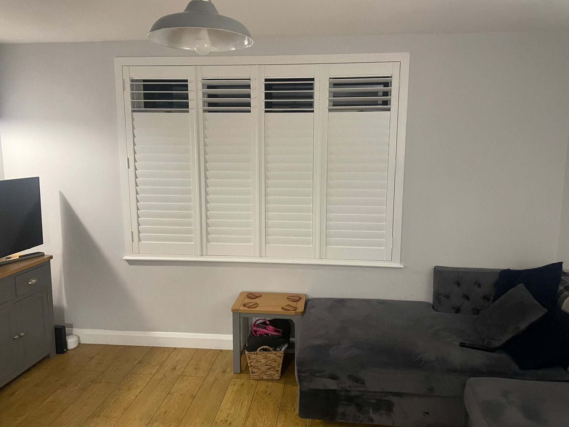 Tier-on-tier shutters in a modern lounge